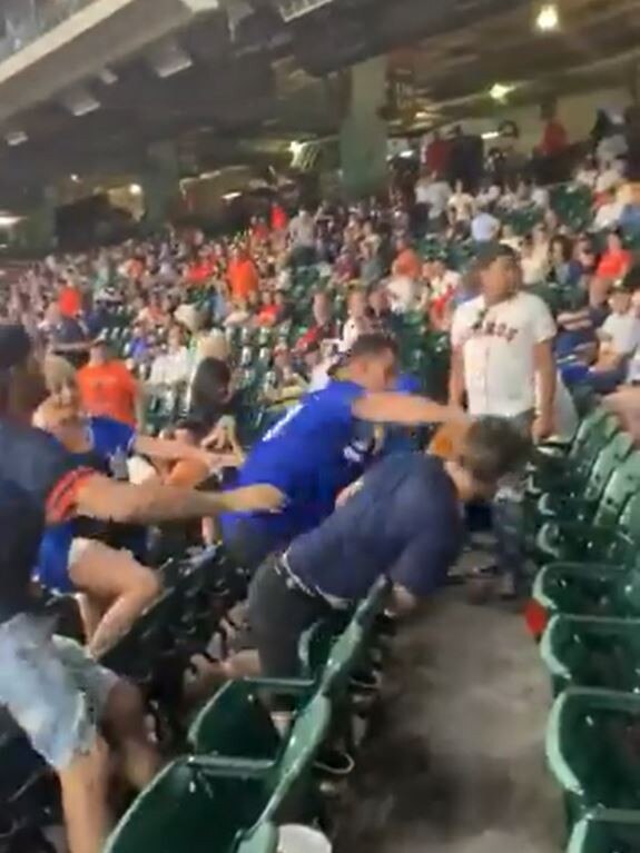 The Dodgers fans landed repeated right hands to another man’s head.