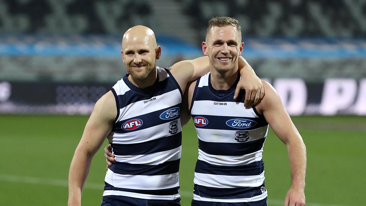 Gary Ablett (L) and Joel Selwood of the Cats leave the field following victory in the round 5 AFL match between the Geelong Cats and the Gold Coast Suns at GMHBA Stadium on July 04, 2020. Picture: Graham Denholm/AFL Photos via Getty Images