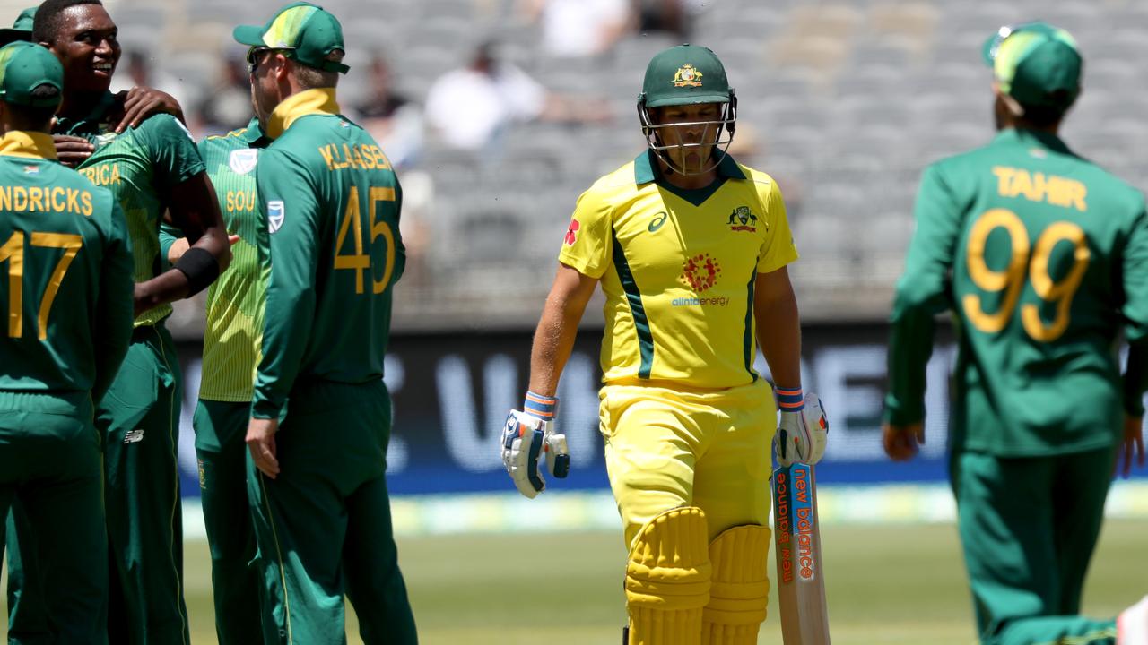 South Africa players celebrate as Aaron Finch leaves the field after being dismissed for just five runs.