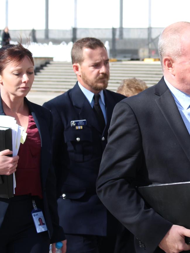 Acting Sergeant Nathan Macklin leaves the inquest last year.