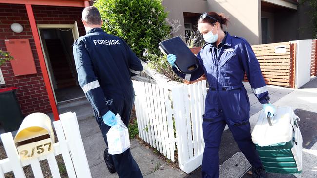 Detectives and forensic police at Sarah Gatt’s Kensington home. Picture: Aaron Francis/The Australian