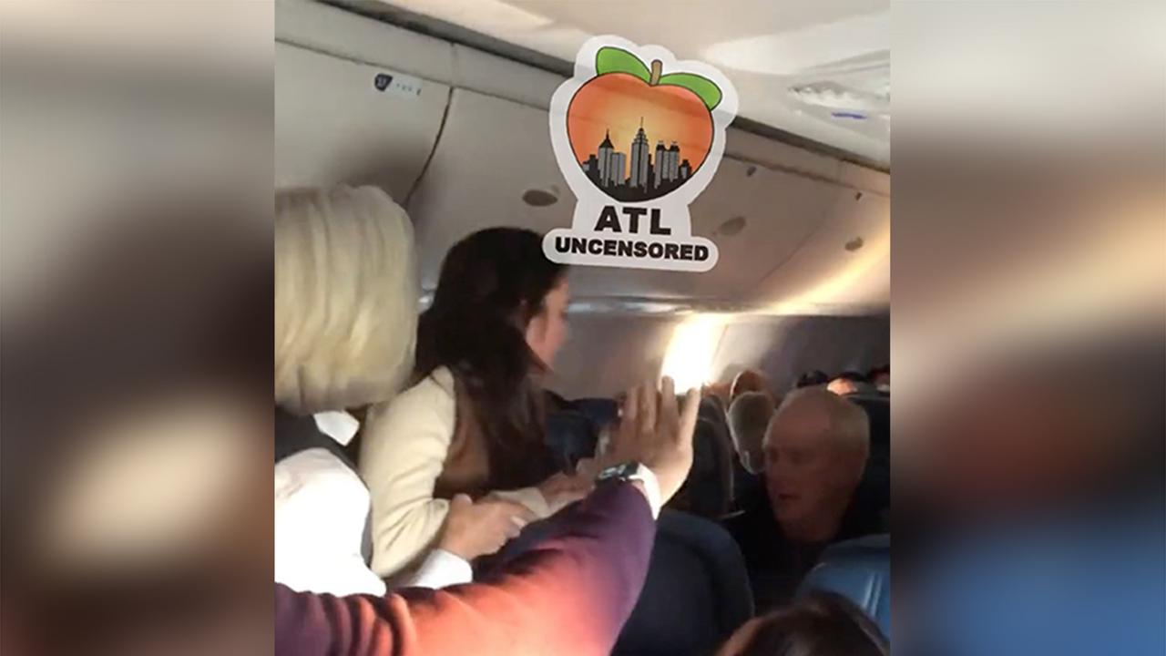 A flight attendant tried to intervene. Picture: Twitter.