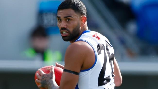 HOBART, AUSTRALIA - AUGUST 26: Tarryn Thomas of the Kangaroos in action during the 2023 AFL Round 24 match between the North Melbourne Kangaroos and the Gold Coast SUNS at Blundstone Arena on August 26, 2023 in Hobart, Australia. (Photo by Dylan Burns/AFL Photos via Getty Images)