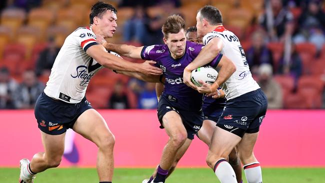 Melbourne Storm hero Ryan Papenhuyzen takes on the Roosters defence. Picture: Bradley Kanaris/Getty Images