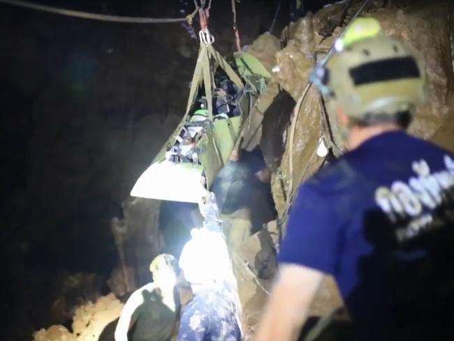 A member of the "Wild Boars" Thai youth football team being moved on a stretcher during a rescue operation inside the Tham Luang cave. Picture: AFP