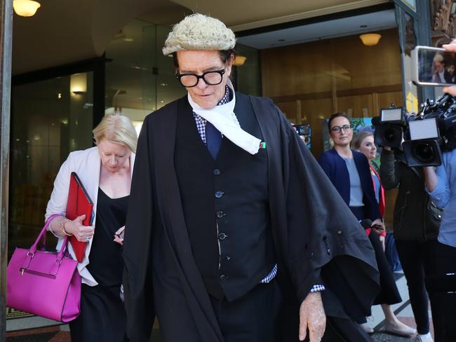 Barrister Charles Waterstreet leaves the Downing Centre after losing his defence case for axe attacker Evie Amati. Picture: Paul Braven