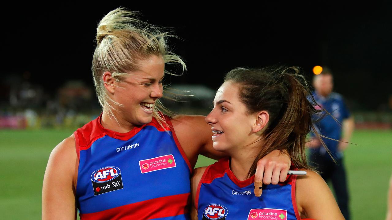 Katie Brennan and Monique Conti have switched colours. Photo: Adam Trafford/AFL Media/Getty Images