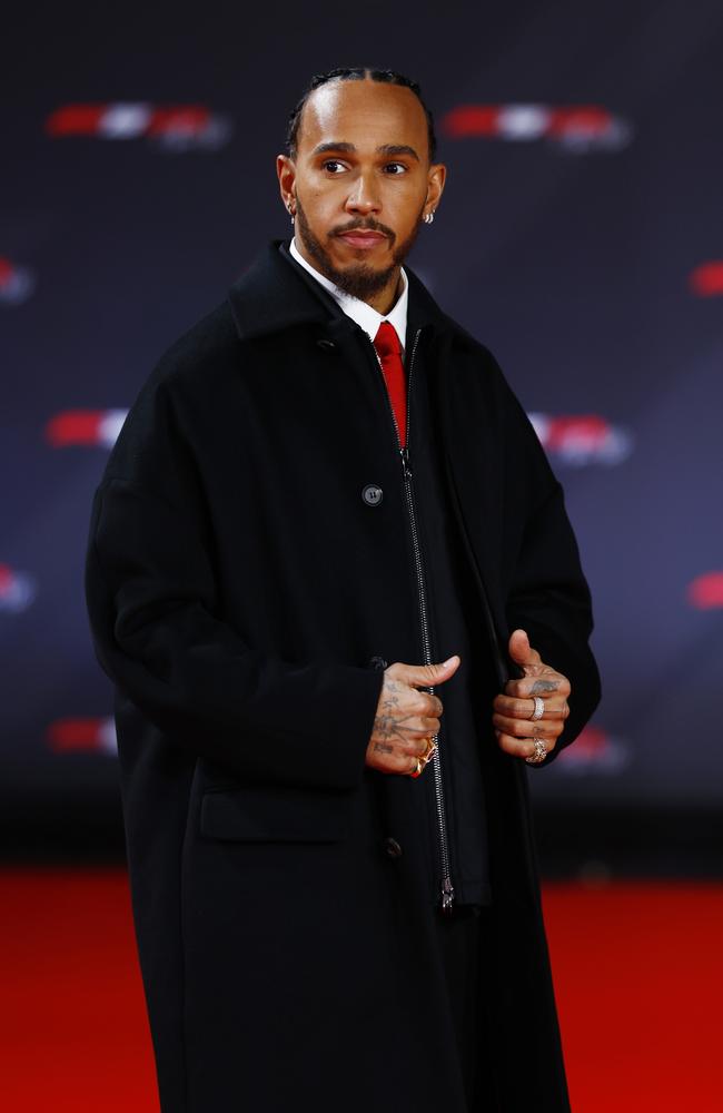 <!DOCTYPE html PUBLIC "-//W3C//DTD HTML 4.0 Transitional//EN" "http://www.w3.org/TR/REC-html40/loose.dtd"><html><body><p>Both Leclerc and Hamilton looked sharp wearing suits and a red tie at F1 75 Live. (Photo by Sam Bloxham/Getty Images)</p></body></html>