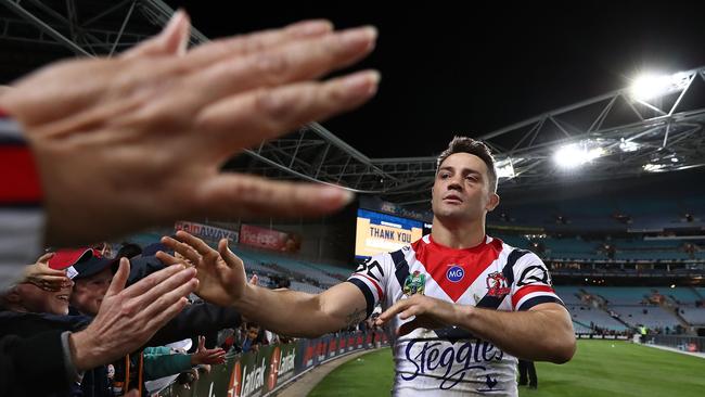 SYDNEY, AUSTRALIA - SEPTEMBER 01:  Cooper Cronk of the Roosters mixes with fans following victory in the round 25 NRL match between the Parramatta Eels and the Sydney Roosters at ANZ Stadium on September 1, 2018 in Sydney, Australia.  (Photo by Mark Metcalfe/Getty Images)