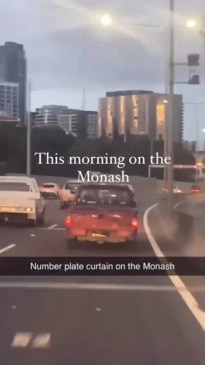 Driver caught using 'number plate curtain' to block rego