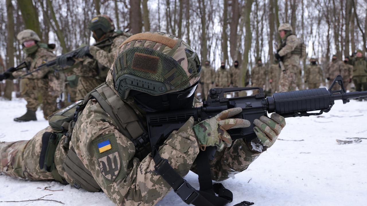 Civilian participants in a Kiev Territorial Defence unit train in a snow-covered forest. Picture: Sean Gallup/Getty Images