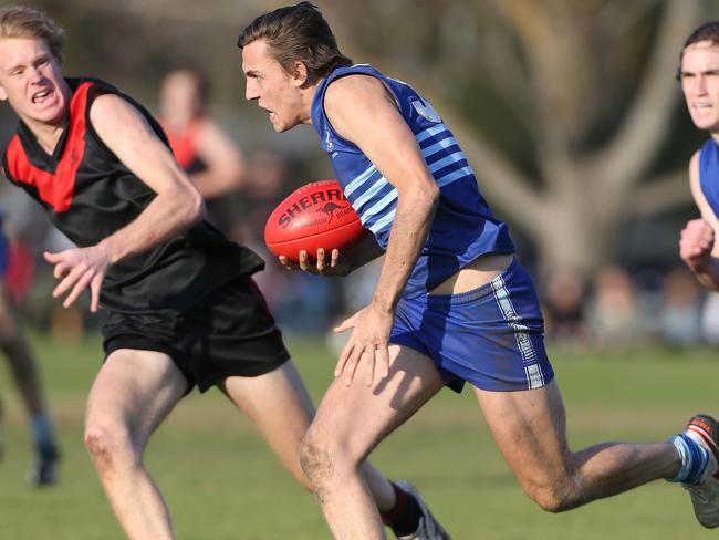 Liam Mackie in action for Sacred Heart in South Australia in 2016 Picture: Stephen Laffer