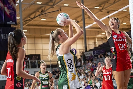 Remi Kamo (right) and Ruby Bakewell-Doran (left) in action for Brisbane North Cougars in Queensland’s state league. The pair has been friends for years. Photo: Supplied