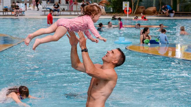 Peter Malinauskas with his daughter Eliza at the Adelaide Aquatic Centre in North Adelaide on February 12, where he announced plans to redevelop the site if Labor wins the March election. Picture: Brenton Edwards