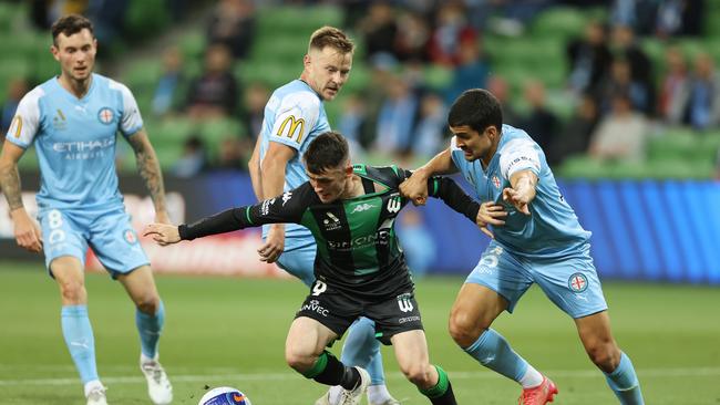 MELBOURNE, AUSTRALIA – DECEMBER 04: Dylan Wenzel-Halls of Western United is challenged by Nuno Reis of Melbourne City during the A-League Mens match between Melbourne City and Western United at AAMI Park, on December 04, 2021, in Melbourne, Australia. (Photo by Robert Cianflone/Getty Images)