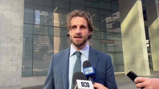 Lawyers outside Brisbane Supreme Court