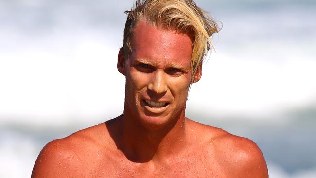 Gold Coast City Lifeguard Nick Malcolm on duty at Mermaid Beach. Pic by David Clark