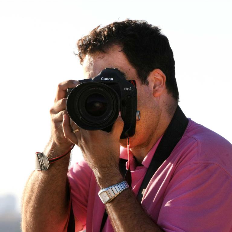 Amateur photographer Chris Lawson from Terranora takes a photo of Gold Coast Bulletin photographer Scott Powick taking a photo of him at Snapper Rocks Coolangatta Photo: Scott Powick Newscorp