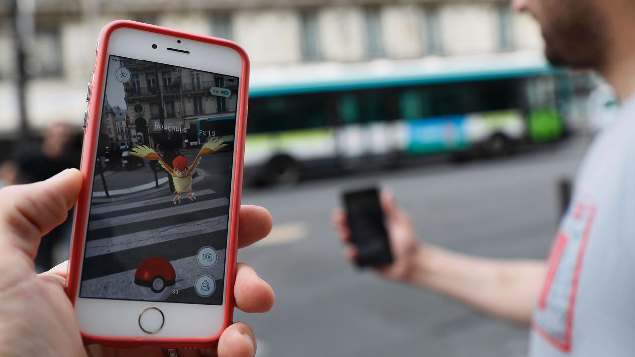 Los Angeles police officers were fired after they ditched a robbery call to play Pokemon Go Hunt. Picture: AFP Photo / Thomas Samson