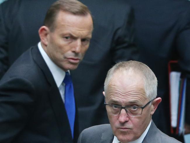 Job ID PD434093. Question Time in the House of Representatives in Parliament House in Canberra. The Prime Minister Tony Abbott with Malcolm Turnbull after Question Time in the House of Representatives in Parliament House Canberra. Pic by Gary Ramage