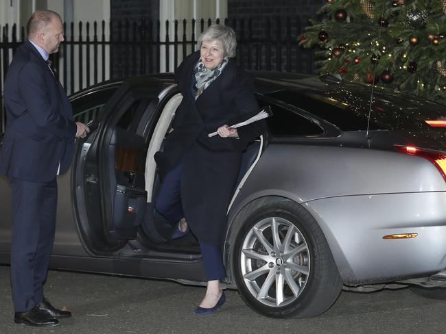 British Prime Minister Theresa May arrives 10 Downing Street for Prime Minister's Questions, in London, Wednesday Dec. 12, 2018.  British Prime Minister Theresa May battled on Wednesday to save her job, her EU divorce bill and maybe even Brexit itself as lawmakers in her Conservative Party held a no-confidence vote on her leadership. (AP Photo/Tim Ireland)