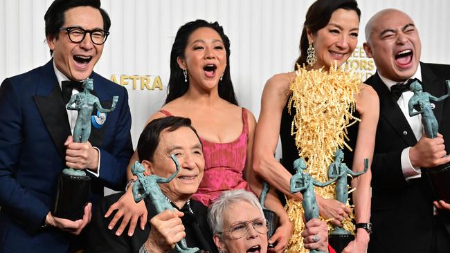 Actors Michelle Yeoh, Ke Huy Quan, Stephanie Hsu, Jamie Lee Curtis, James Hong, and cast pose with the award for Outstanding Performance by a Cast in a Motion Picture for "Everything Everywhere All at Once" during the 29th Screen Actors Guild Awards. Photo: AFP