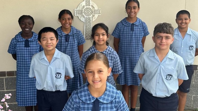 St Michael's Primary School Blacktown captain Stella Borg (front), with her fellow leaders. Back row: Achala Athum, Nia'lani Mokoia, Arieta Ma'afu and Samyog Gautam. Middle: Kobe Royeras, Iyana Hamid and Christian Malki.