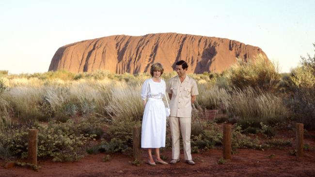 Then Prince Charles and the late Princess Diana standing in front of Ayers Rock during their official royal tour in 1983. Picture: Tim Graham Photo Library via Getty Images