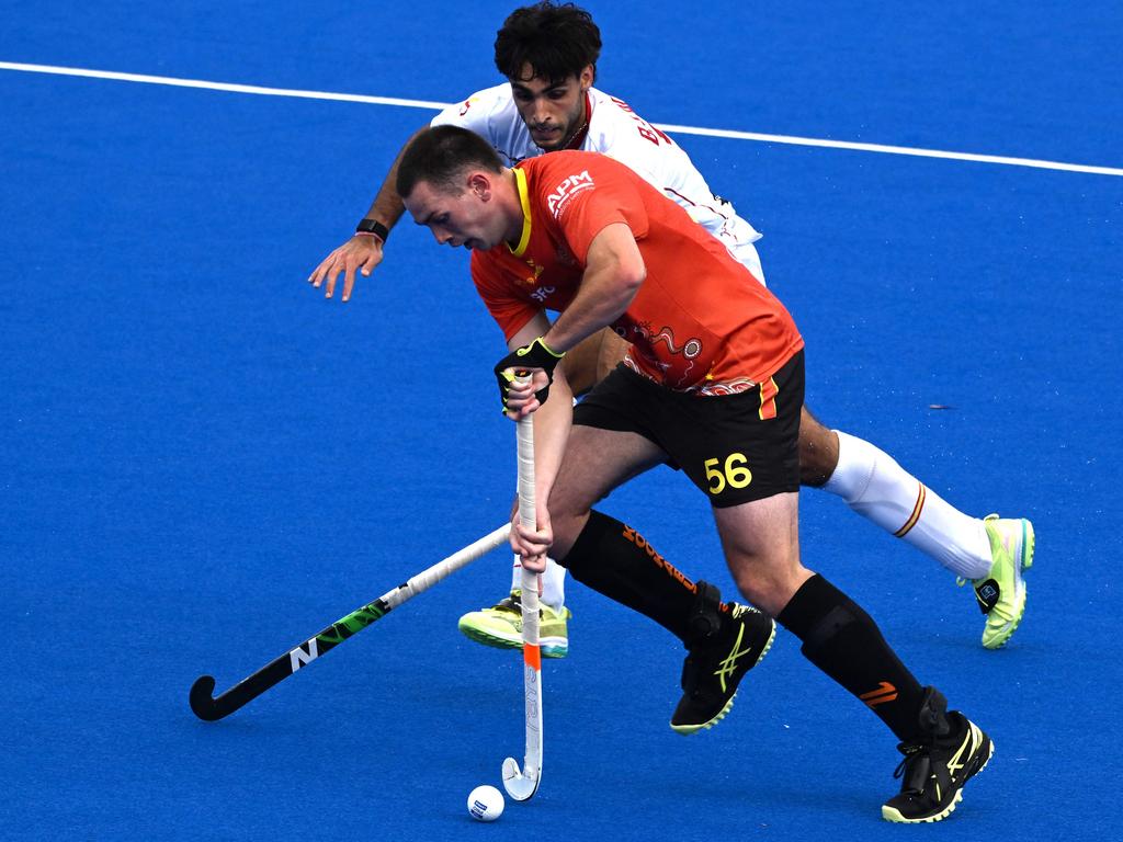 Australia’s Connar Otterbach fights for the ball with Spain's Borja Lacalle. Picture: AFP