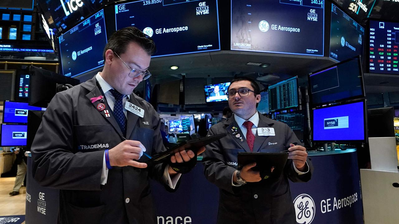 Traders work on the floor of the New York Stock Exchange as the S&amp;P 500 fell 1.5 per cent on Friday. Picture: AFP