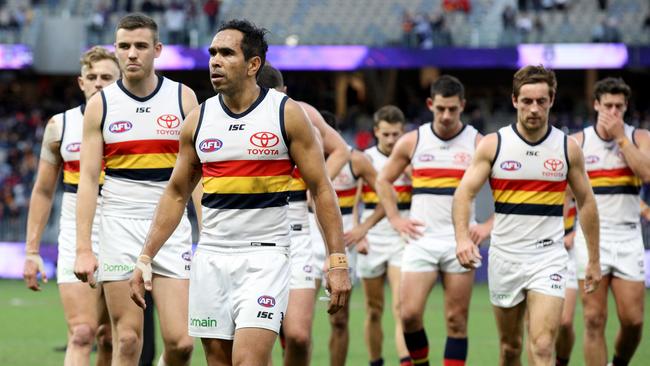 Eddie Betts leads Crows players off the field after losing the Round 12 AFL match between the Fremantle Dockers and the Adelaide Crows at Optus Stadium in Perth, Sunday, June 10, 2018. (AAP Image/Richard Wainwright) NO ARCHIVING, EDITORIAL USE ONLY