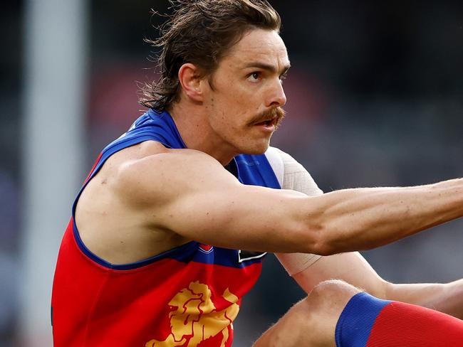 MELBOURNE, AUSTRALIA - AUGUST 17: Joe Daniher of the Lions kicks a goal during the 2024 AFL Round 23 match between the Collingwood Magpies and the Brisbane Lions at The Melbourne Cricket Ground on August 17, 2024 in Melbourne, Australia. (Photo by Michael Willson/AFL Photos via Getty Images)