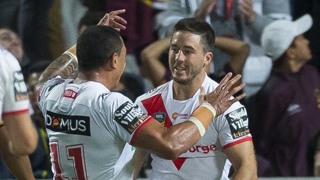 Ben Hunt of the Dragons celebrates an intercept try.