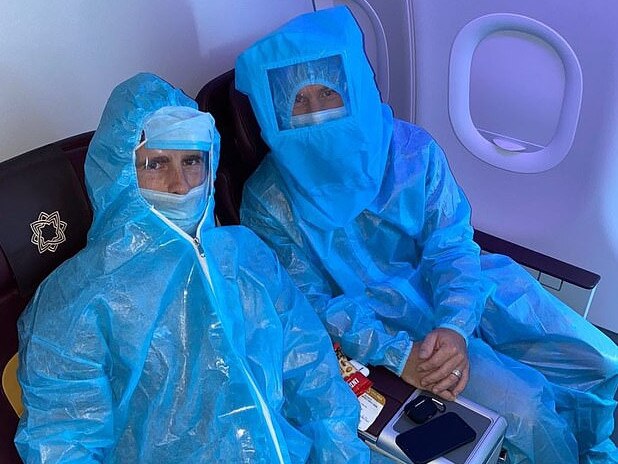 New Zealand star Kane Williamson and Aussie ace David Warner wearing hazmat suits while aboard flights in India. Picture: Instagram