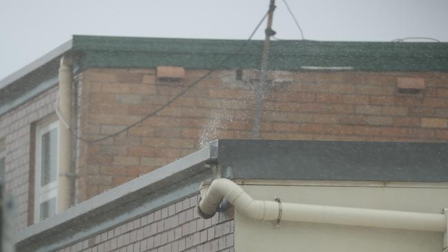 Wind blowing water up out of drains at Mona Vale. Picture: John Grainger