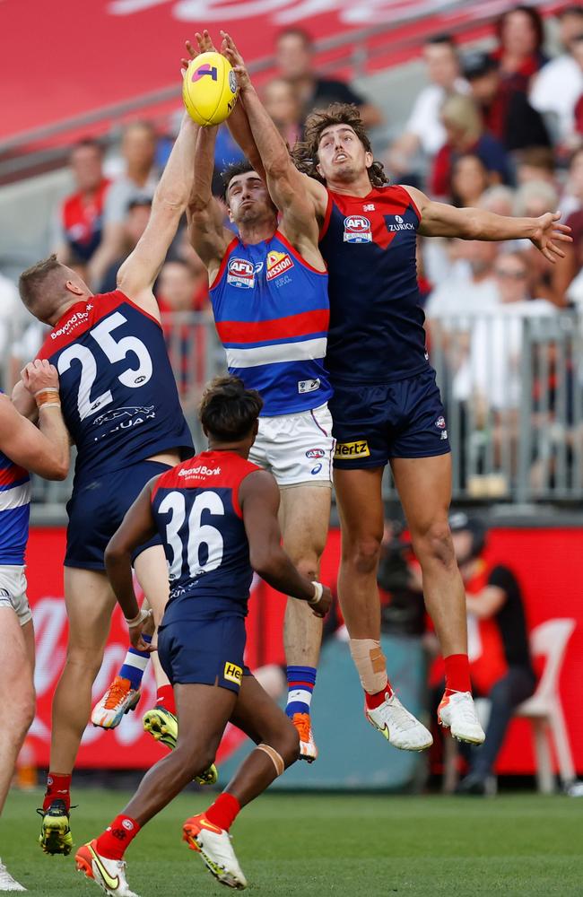 Easton Wood of the Bulldogs and Luke Jackson of the Demons compete for the ball. Picture: Michael Willson/AFL Photos via Getty Images