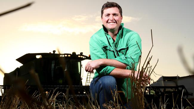 Wade Dabinett in a wheat field at the family farm in Parilla. Picture Simon Cross