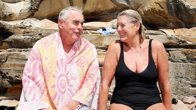 Peter and Julie McAlpin discuss age-related issues at Bronte Beach. Picture: Tim Hunter