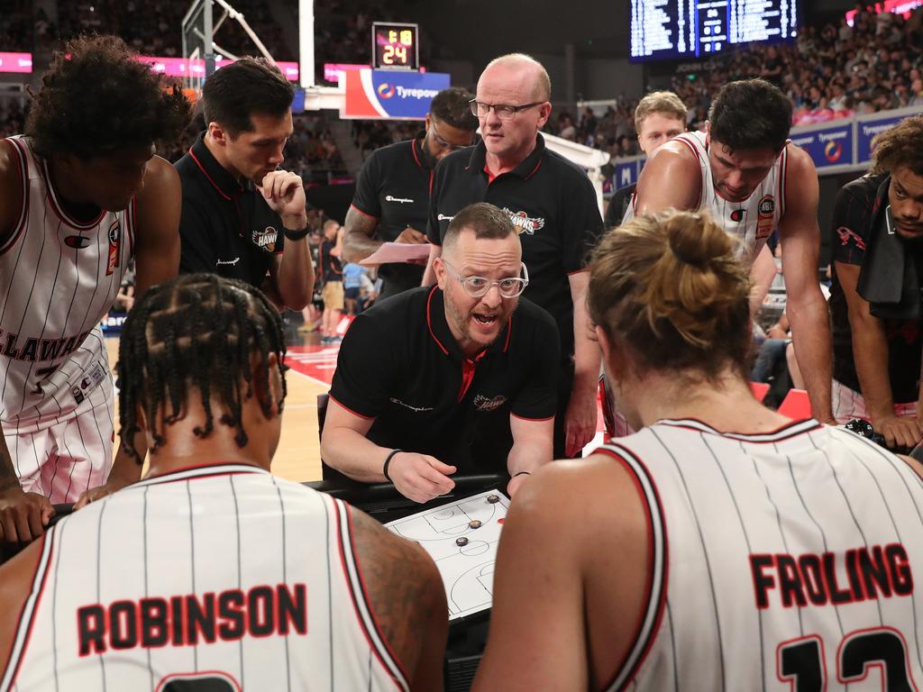 Former Illawarra coach Jacob Jackomas talks to players during the round five NBL match between Melbourne United and the Hawks at John Cain Arena. Photo: Kelly Defina/Getty Images.