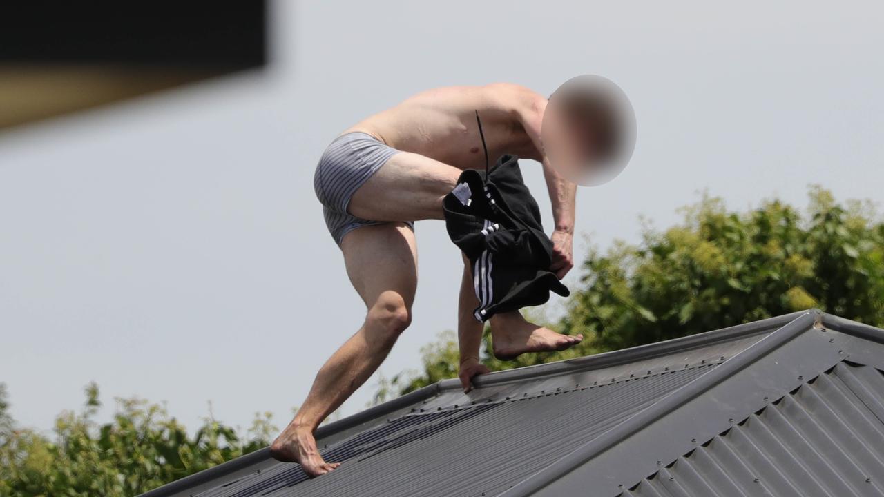 A man on the roof of a Norlane home near the pub in a stand-off with police. Picture: Mark Wilson