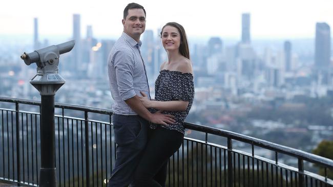 ‘It is a great city to live in but it can be very busy’ ... Herman and Charnelle Cronje at Brisbane’s Mount Coot-tha lookout. Picture: Lyndon Mechielsen