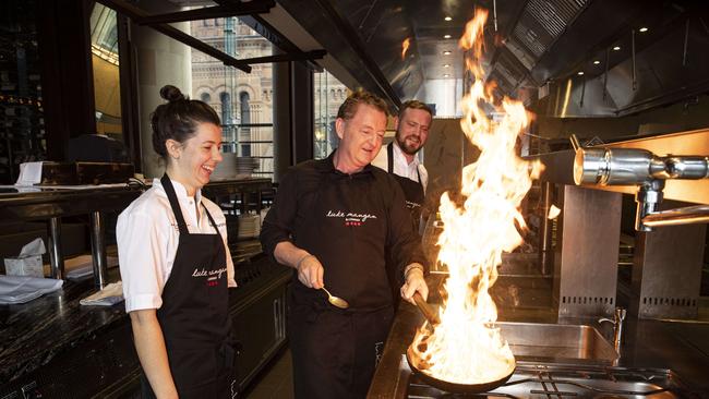 Chef Luke Mangan with sous chef, Natalie Murphy and chef de partie Dylan Grosas in the kitchen at Glass Brasserie at the Hilton Hotel in Sydney. Picture: John Feder