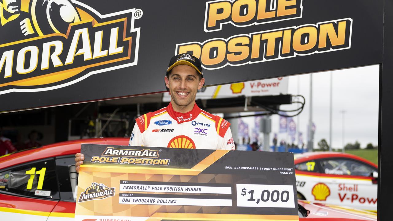 Anton de Pasquale celebrates after taking pole position. (Photo by Daniel Kalisz/Getty Images)