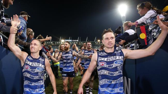 Joel Selwood and Mitch Duncan celebrate a Geelong victory. Picture: Darrian Traynor/Getty Images.