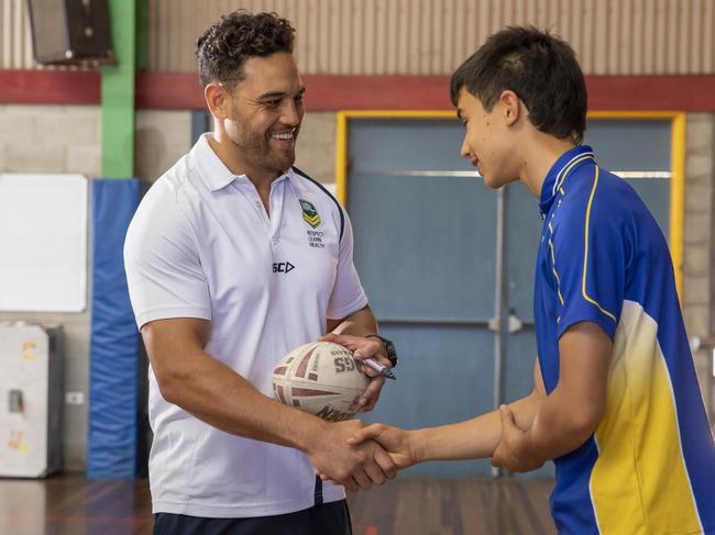 Former Cowboys player Antonio Winterstein toured Mackay schools, including Mackay North State High School, with the NRL premiership trophy on Thursday. Picture: Contributed