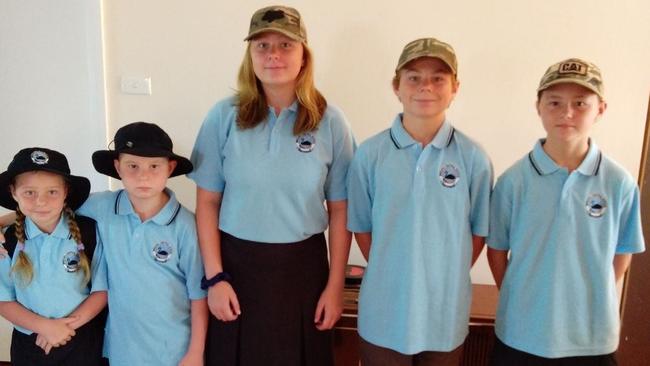 Haylie Reynolds, 17, centre, with her younger siblings, from left, Katie, Shane, Jackson and Elizabeth. Haylie stepped into a caring role to support her siblings alongside her father from a young age. Picture: Supplied