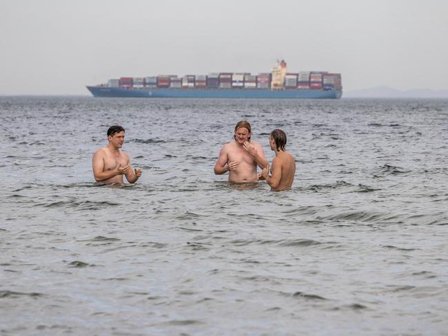 People cool off in St Kilda as the temperatures climb. Picture: Jake Nowakowski