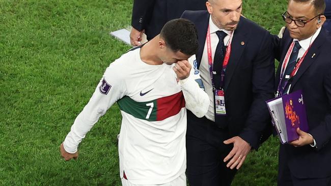 Cristiano Ronaldo walks off the pitch in tears after Portugal's defeat to Morocco in the World Cup. Picture: Getty Images