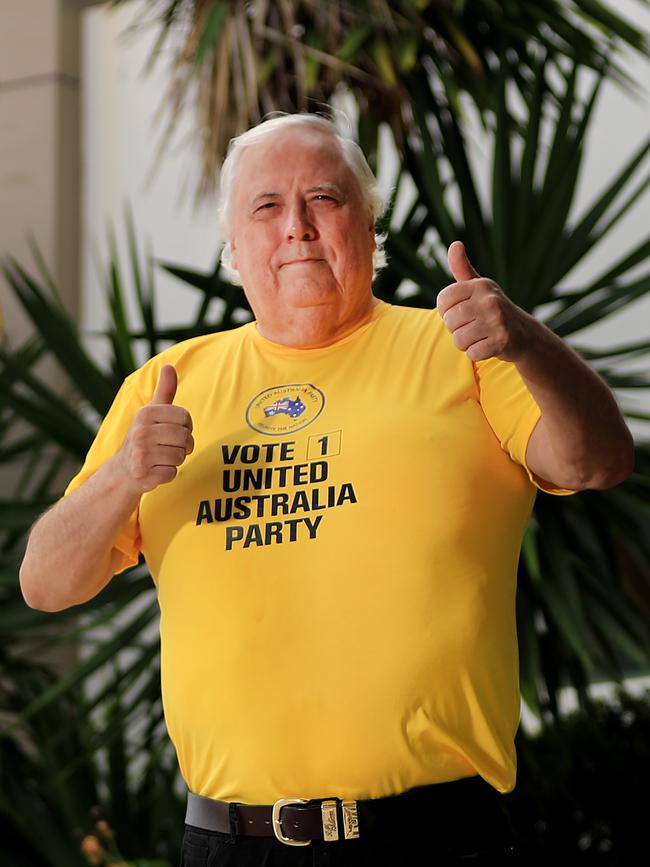 Clive Palmer ran more than 150 candidates in the election, here he is illustrating how many were successful.