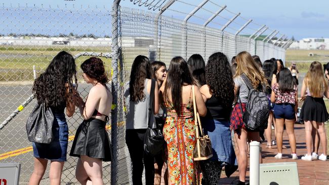 Fans waiting for One Direction to arrive at Adelaide Airport ahead of their concert. Photo Sam Wundke.